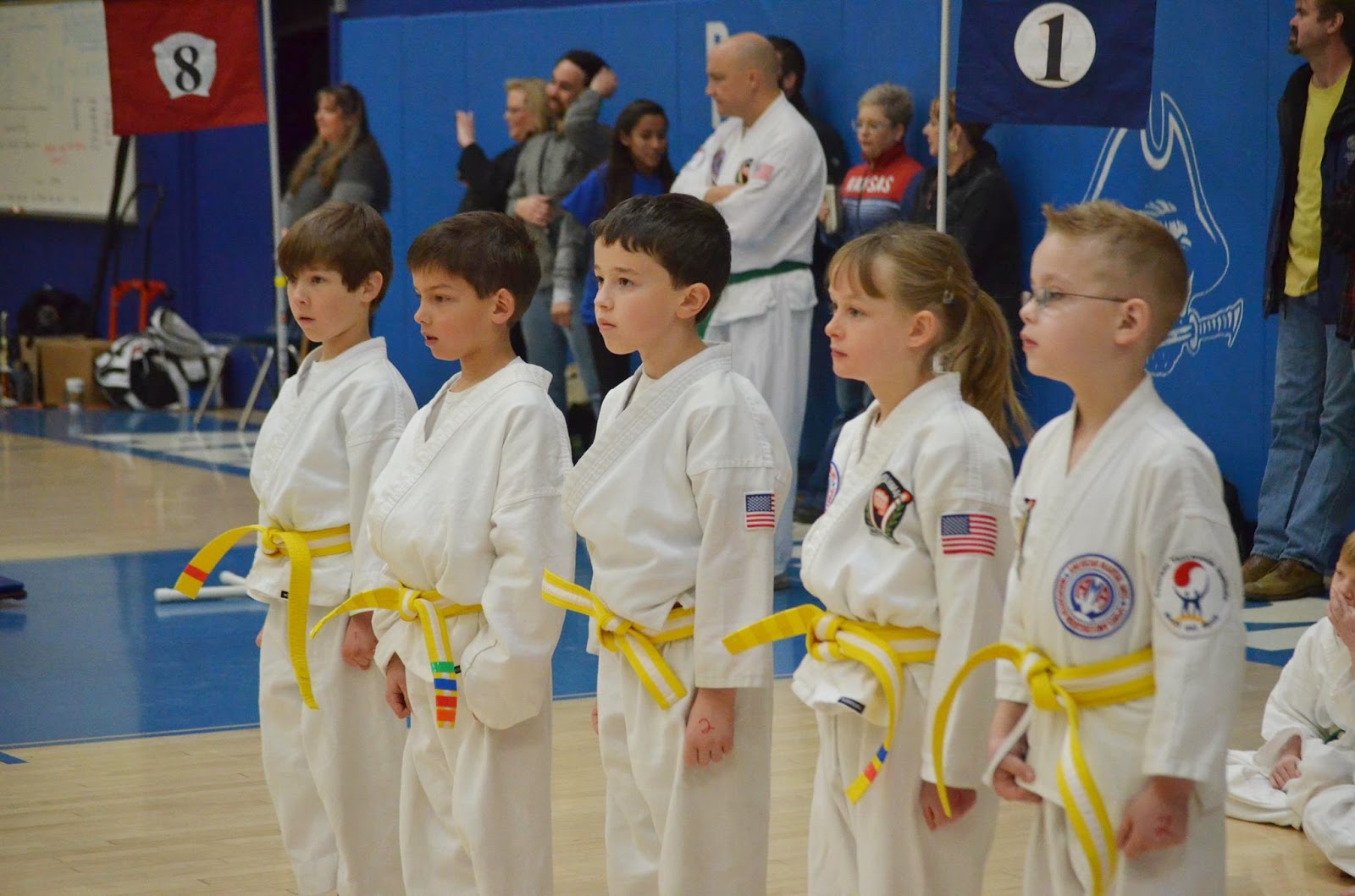 Martial arts students ready to compete at a tournament