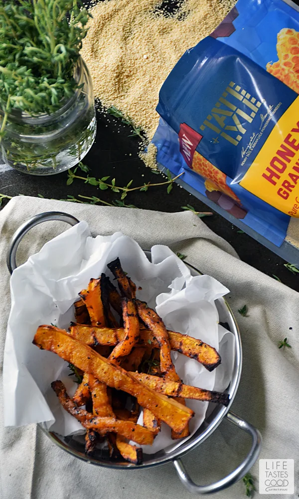 Honey Baked Butternut Squash Fries | by Life Tastes Good  are a sweet and savory side dish perfect for fall! The subtle honey flavor combined with the sweet, nuttiness of butternut squash and a touch of thyme for that savory flare, will have you begging for more! #LTGrecipes
