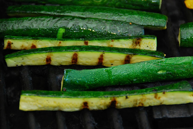 close up of zucchini roasting on grill 
