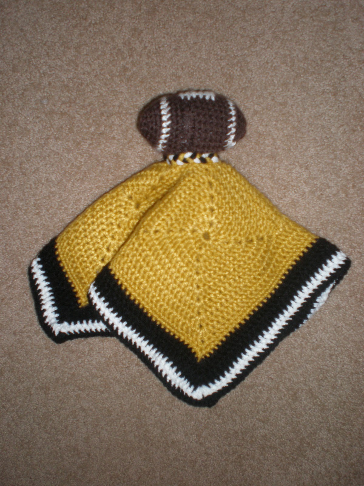 amy-s-crochet-football-lovie-blanket