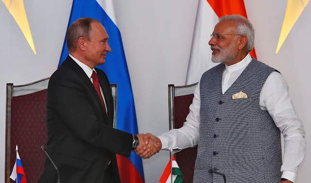 Image Attribute: Russian President Vladimir Putin (L) shakes hands with India's Prime Minister Narendra Modi during exchange of agreements event after India-Russia Annual Summit in Benaulim, in the western state of Goa, India, October 15, 2016. REUTERS/Danish Siddiqui