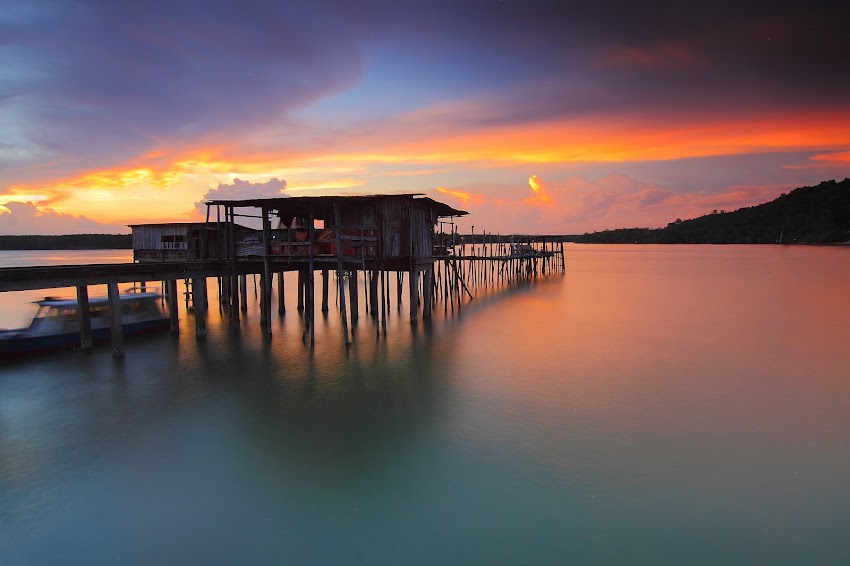 Wooden Cabin On Water And Sunset Wooden Cabin On Water And Sunset