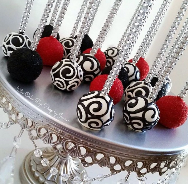 I'm loving the bright bold colors and design on these cake pops from The Cake Pop Shop