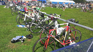 bicycles on racks in a duathlon transition area
