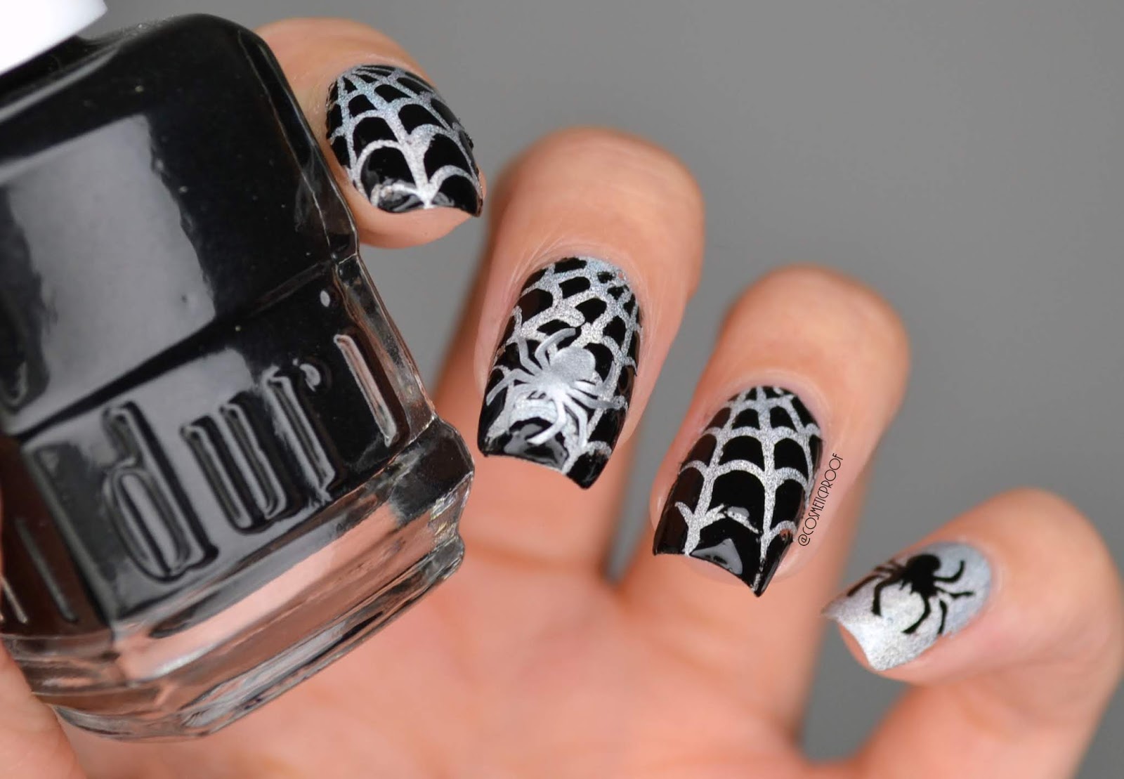 9. "Halloween Nail Design with Bat and Spiderweb Accents" - wide 2