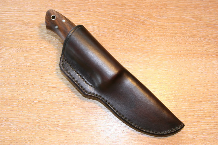 Simple 'quiver' style sheath for fixed blade knife.