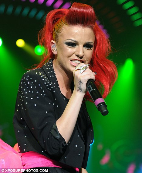 Daddy's girl: Cher Lloyd shows off her EIGHTH inking - a tribute to her