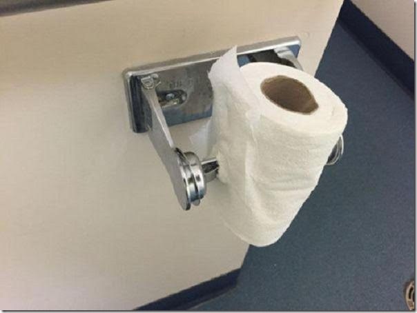 Toilet roll, how should it hang? down the back or over the ...