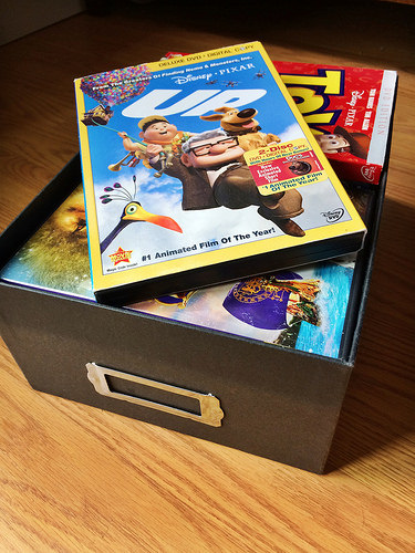 Re-purposed Storage Solutions: photo box to DVD holder
