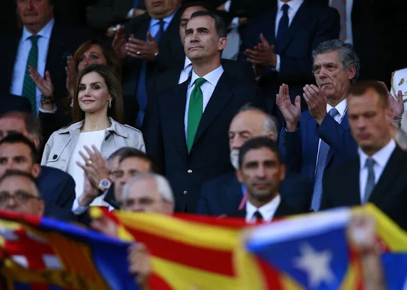 King Felipe and Queen Letizia watched King's Cup (Copa del Rey) final match at Vicente Calderon Stadium in Madrid. Queen Letizia wore Hugo Boss Cascadia Double Breasted Trench Coat