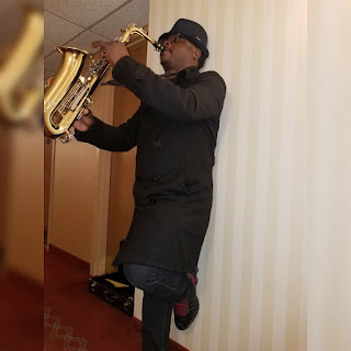 Mr muyiwa a saxophonist