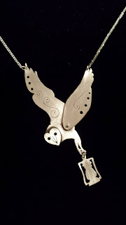 https://www.etsy.com/listing/218475459/sterling-silver-barn-owl-pendant