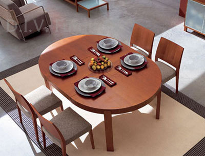Modern Cabinet Design: Modern round dining table designs.
