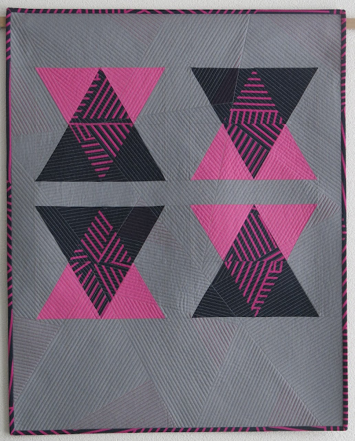 Luna Lovequilts - A modern triangle quilt with transparency effect