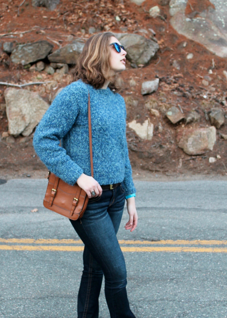 Blue handmade knit sweater, LA Hearts blue reflective sunglasses, bootcut dark washed jeans and leather slip on sneakers