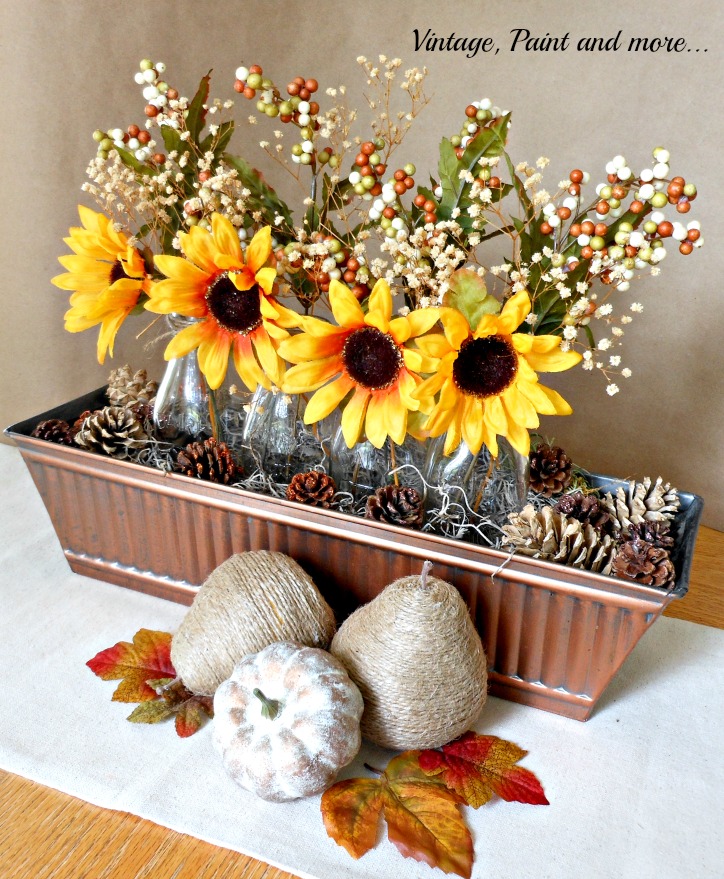 Vintage, Paint and more... sunflower centerpiece in a vintage bronze trough with twine wrapped pears