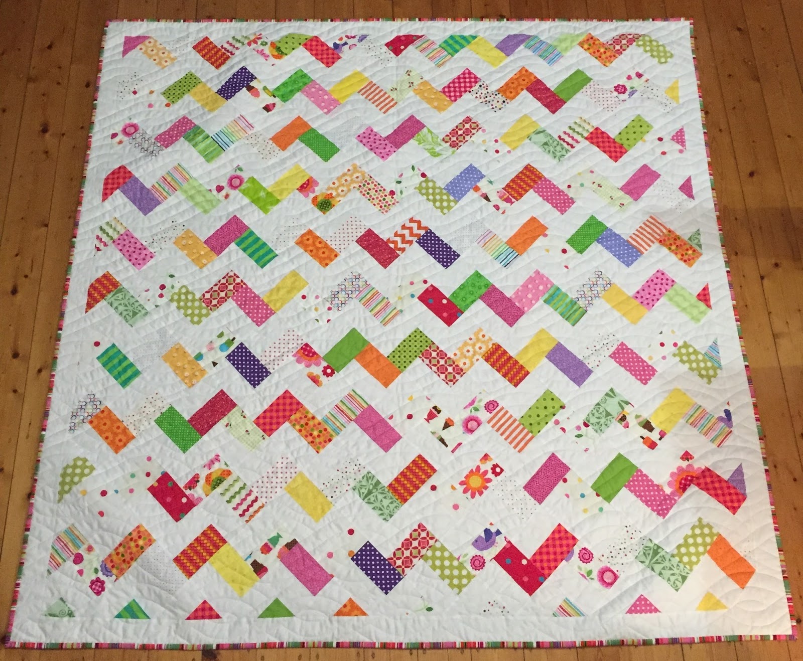 Lynda in Wonderland Scrappy Zig Zag Quilt