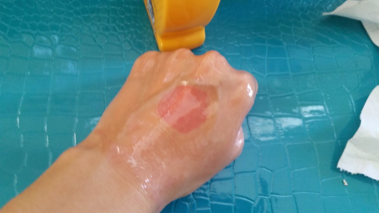 cleansing oil on the back of my hand to cleanse off makeup