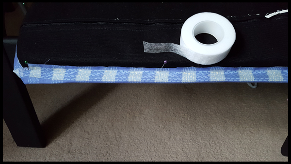 adding tape to cushion cover 