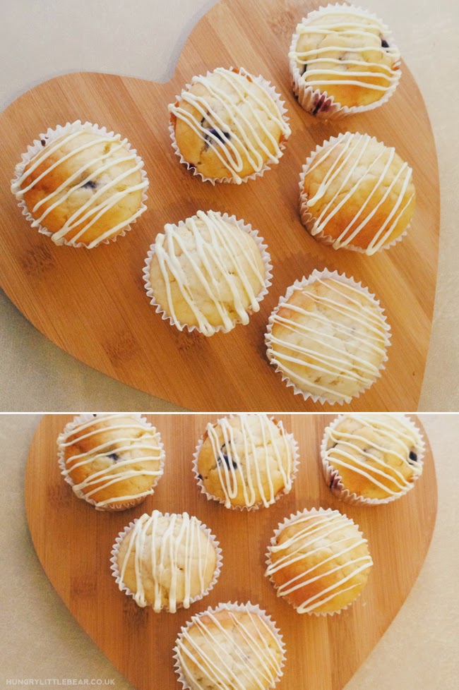 Deliciously moist and soft blueberry muffins made with greek yoghurt and a hint of vanilla, and drizzled with white chocolate. hungrylittlebear