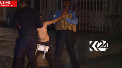 d Dramatic moment ISIS would-be child suicide bomber is stripped of his explosives belt by police in Iraq (Photos & Video)