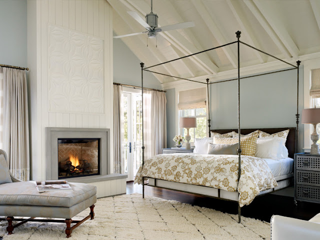 Serene lofty bedroom blue painted walls poster bed fireplace Ken Fulk
