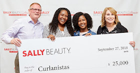 Founders of Curlanista receiving the Sally Beauty Cultivate Award