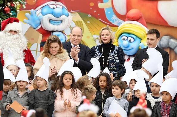Prince Albert II, Princess Charlene, Louis Ducruet and Camille Gottlieb attended Children's Christmas ceremony