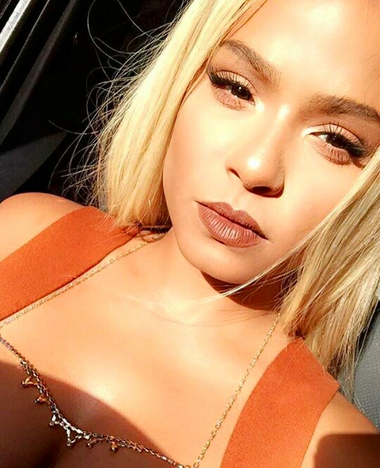 Singer Christina Milian Debuts Blonde Hair At The Power Rangers