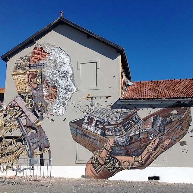 Street Art Collaboration By Vhils and Pixel Pancho On The Streets Of Lisbon, Portugal. 1