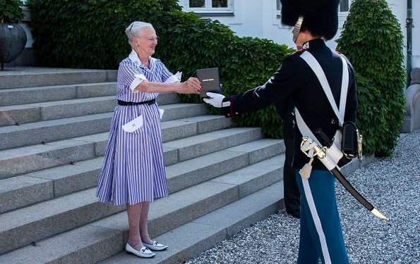 Queen Margrethe attended the Royal Life Guards' Parade at Marselisborg. Marselisborg, is a royal residence of the Danish royal family