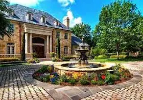 Summer home with water fountain.
