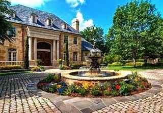 Summer home with water fountain.