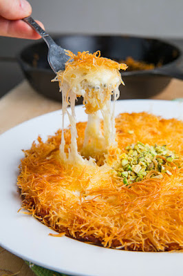 Kanafeh/Künefe (Sweet Cheese Pastry) Recipe A pastry consisting of hot cheese in between layers crispy shredded phyllo dough in a swe Kanafeh/Künefe (Sweet Cheese Pastry) Recipe