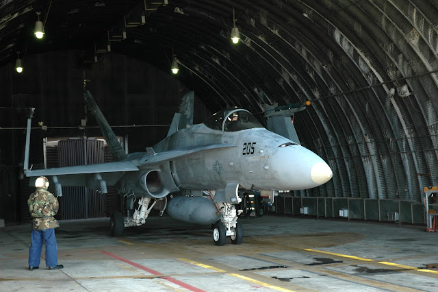 F/A-18 Hornet gets ready to taxi from fortied bunker.