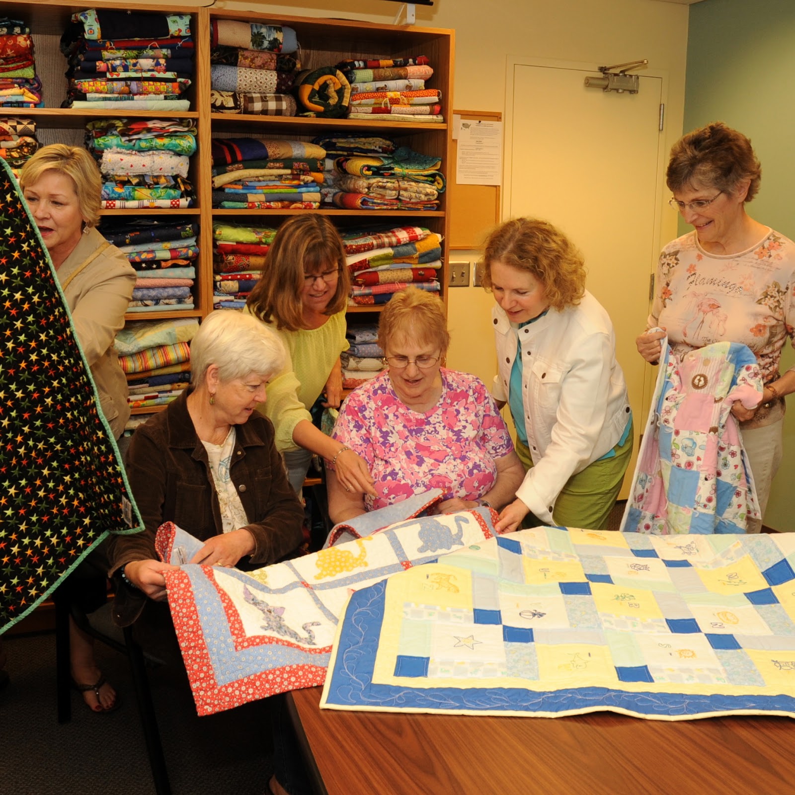 Pine Needle Quilt Shop Quilters from The Pine Needle visit CARES Northwest