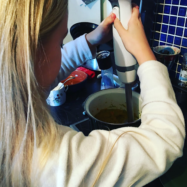 10-year-old making soup