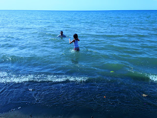 Family in Time Beach Vacation, North Bali