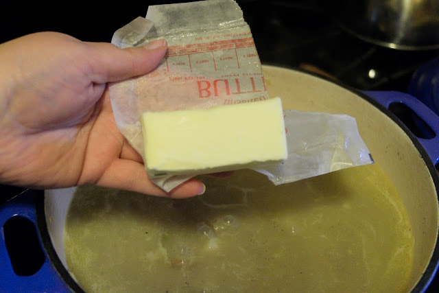 Butter being added to the soup