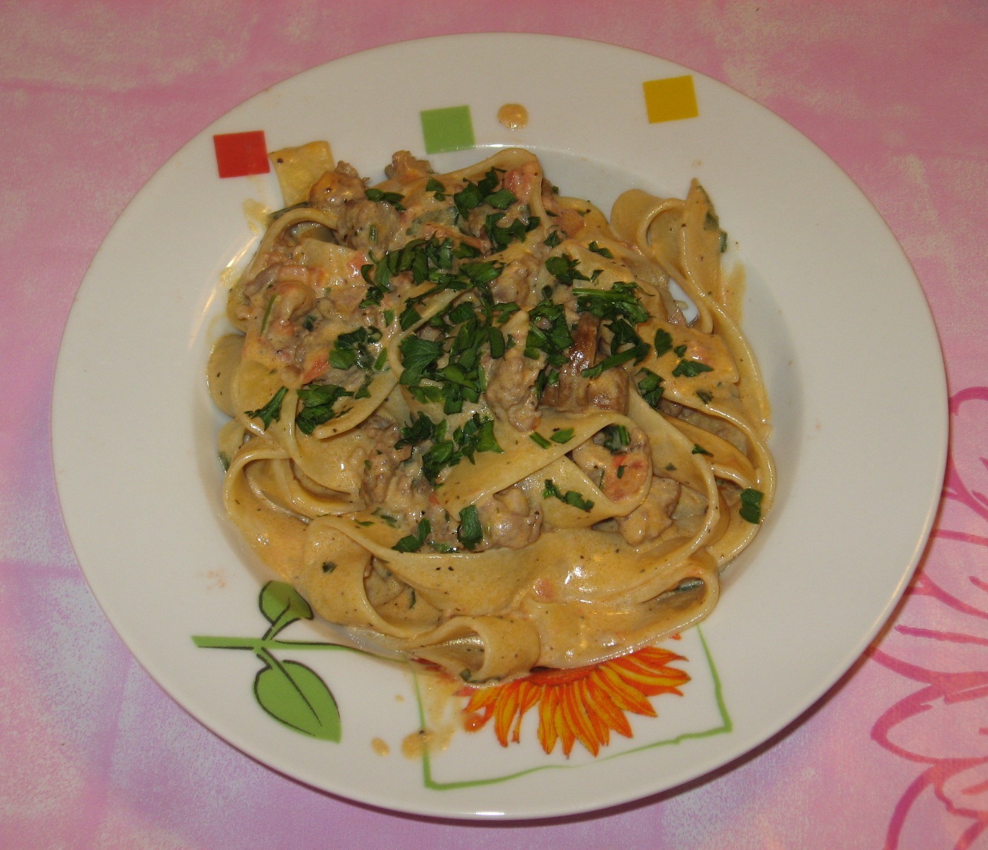 Pappardelle con porcini e salsiccia
