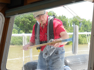 Didn't get everything done at the dock.  Fred does windows underway.