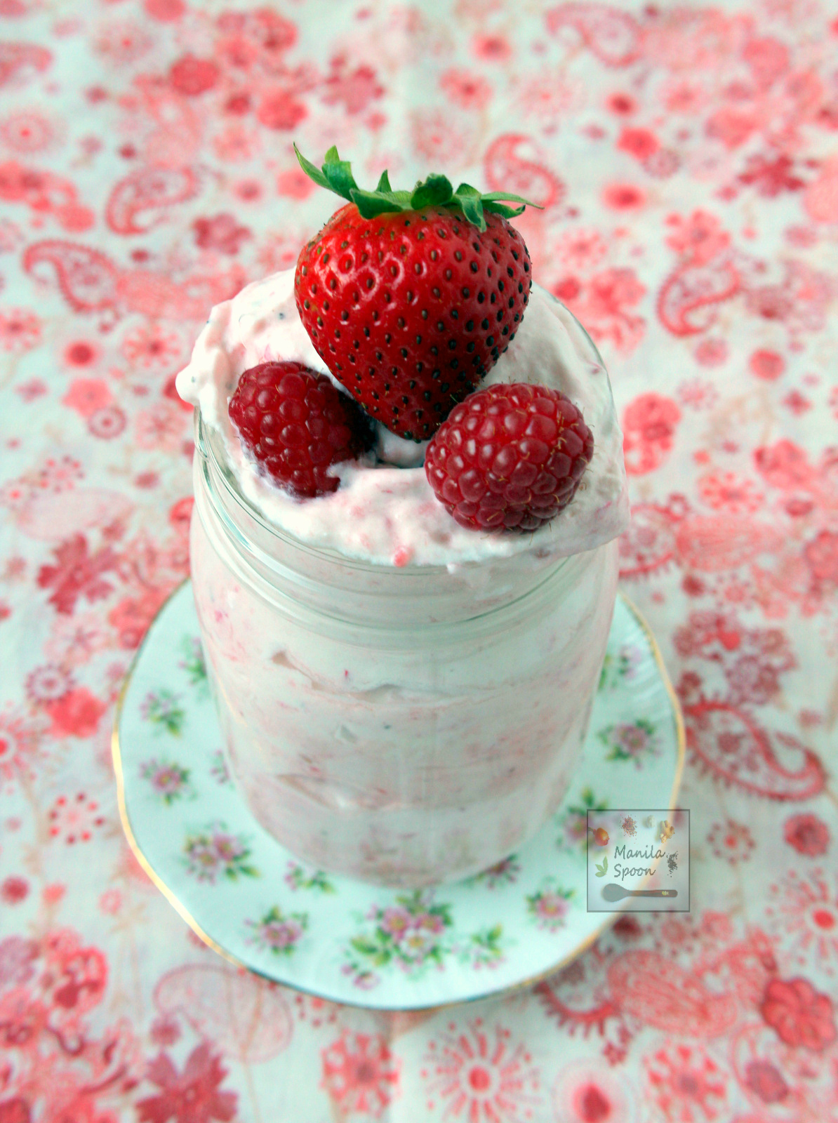 A yummy, quick and super-easy way to enjoy summer berries! Puree the berry or fruit of choice, fold into the sweetened whipped cream and voila - a fruity-licious and creamy Strawberry and Raspberry Fool that everyone will love! #strawberryfool #raspberryfool #englishdessert #summer