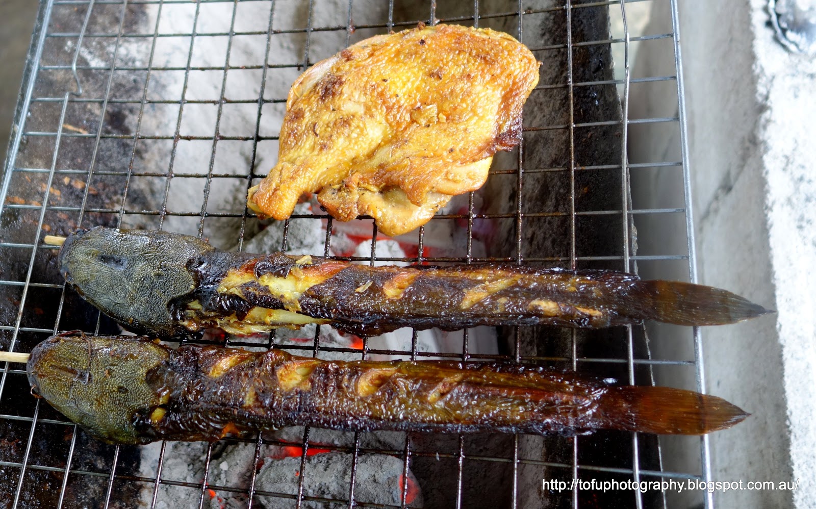 Tofu Photography Grilled catfish and chicken at a restaurant in Khao