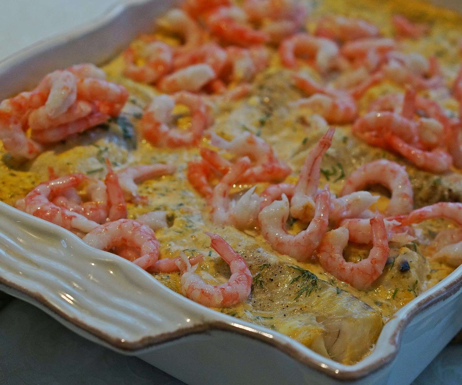 Mor-Mia´s: Torskrygg under krämig hummersås med bacon