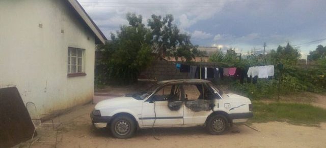 Photo: Woman catches husband cheating, burns his car while he had sex with mistress