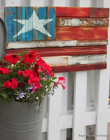 Patriotism reigns with a reclaimed wood flag by Beyond the Picket Fence, featured on ILoveThatJunk.com
