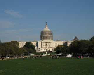 U. S. Capitol building with its dome under restoration, Washington, D.C.