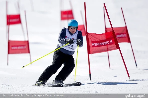 Prince Albert of Monaco passes a gate during a race at the Star Team for Children Charity Event on March 28, 2015 in Sexten, Italy