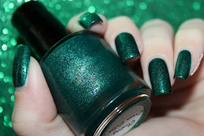 Swatch of the nail polish "Glowing Green Gates" from Eat Sleep Polish