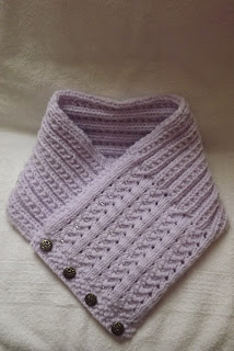 http://www.craftsy.com/pattern/knitting/accessory/pretty-beaded-neck-warmer/136698
